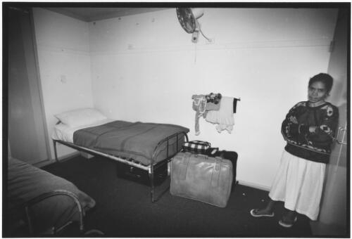 [East Timorese refugee in a bedroom], East Hills Army Base, New South Wales, October 1999 [picture] / John Immig