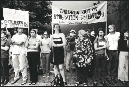 Protests against the detention of refugee children at the Department of Immigration and Multicultural Affairs, The Rocks, and Villawood Immigration Detention Centre, Sydney, New South Wales, January 2002 [picture] / John Immig