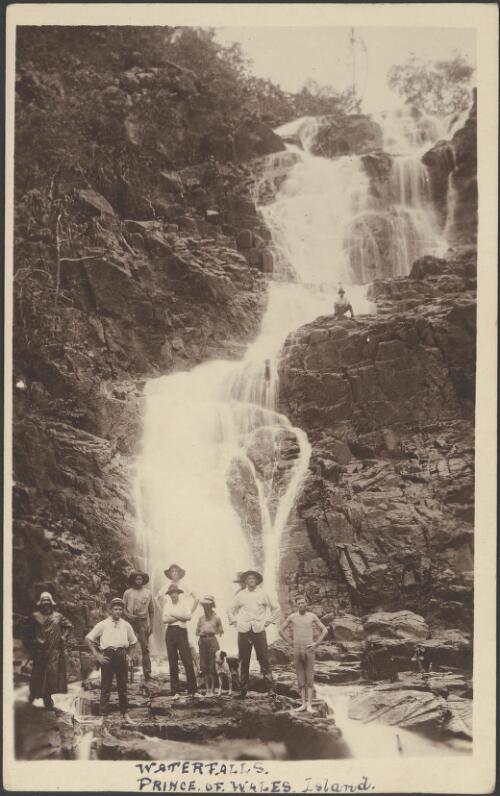 [Group of ten men and a dog at the] waterfalls, Prince of Wales Island, [Torres Straits, ca. 1917-1920] [picture]