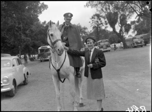 [Mounted policeman posed beside a woman in Olympic uniform, Olympic Games, Melbourne, 8 December 1956] [picture]