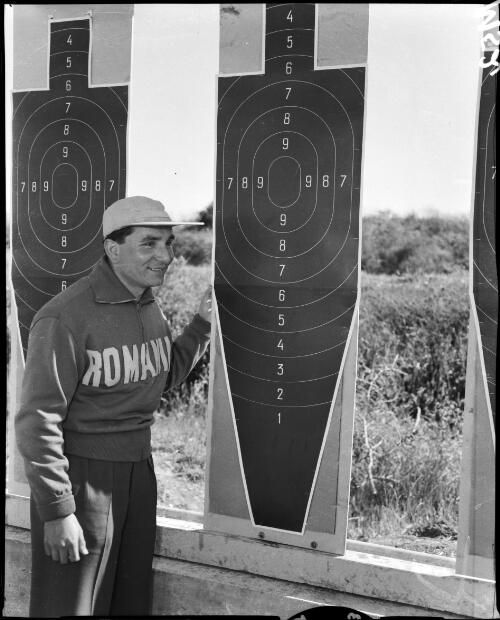 [Romanian competitor next to a shooting target, Olympic Games, Williamstown, 5 December 1956] [picture]