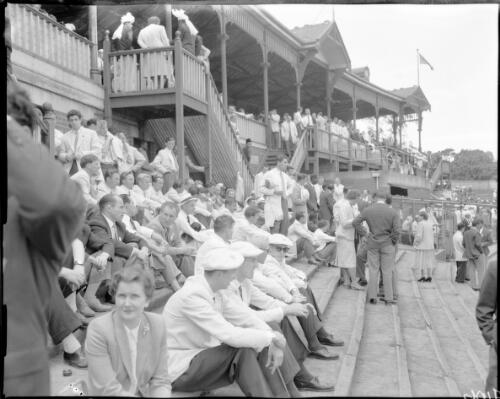 [Spectators sitting in and around the grandstand, Olympic Games, Melbourne, 22 November 1956] [picture]
