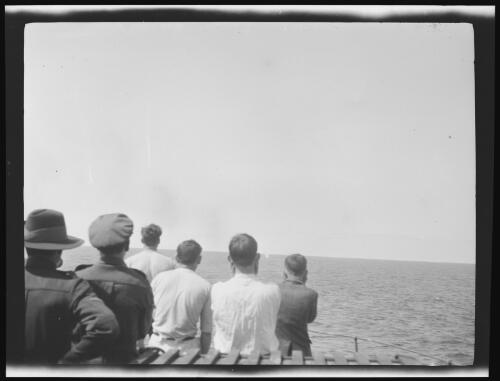 Crew watching the shell strike the water during a practice firing of the 4.7 inch gun, Indian Ocean, 1919 / Michael Terry