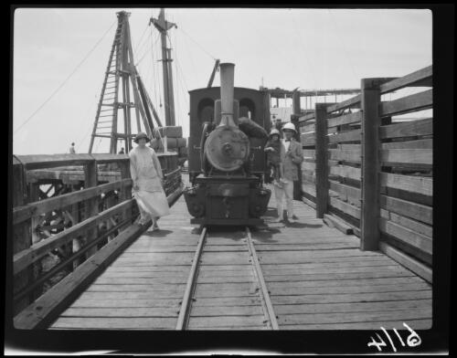 Mr and Mrs Baron and their daughter beside a locomotive 2 ft gauge, Point Sampson, Western Australia, 1923 / Michael Terry