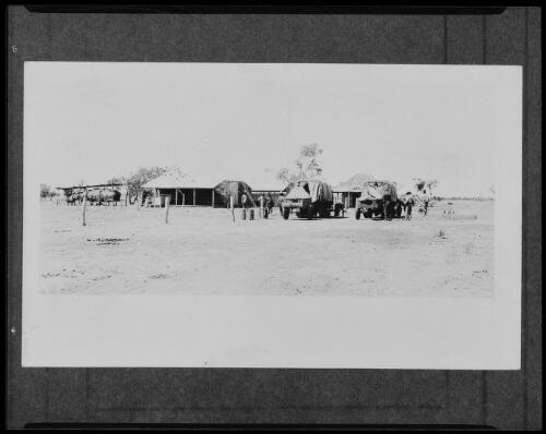 Photograph of a photograph of Terry and company with their trucks at a homestead, possibly Wave Hill Station, Northern Territory, 1925 / Michael Terry