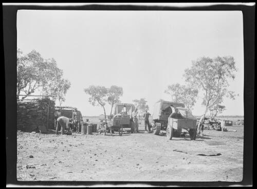Refuelling expedition vehicles at Gordon Downs, Western Australia, approximately 1925, 1 / Michael Terry