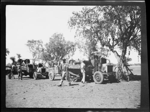 Campsite with two Guy roadless vehicles at a homestead, Fitzroy Crossing, Western Australia, 1925, 2 / Michael Terry