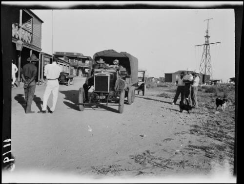 Expedition members and vehicle outside the Pier Hotel, Port Hedland, Western Australia, 1928 / Michael Terry