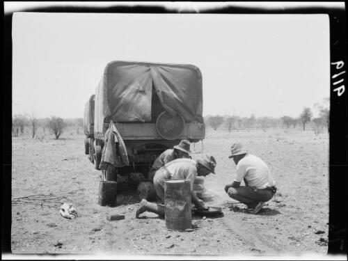 Expedition members panning off prospects near Crown Creek, close to Coniston Station, Northern Territory, 1928 / Michael Terry