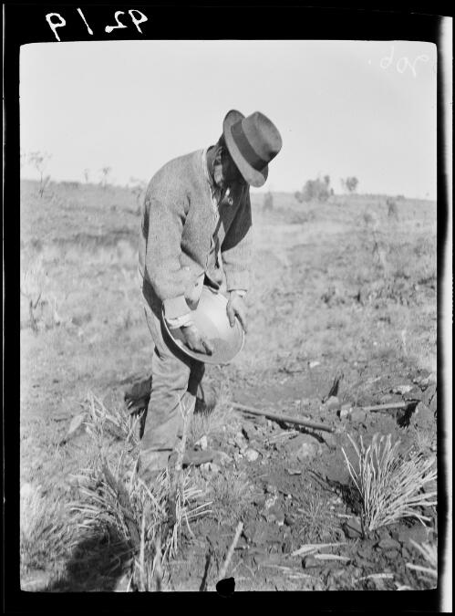 Expedition member panning off prospects near Crown Creek, close to Coniston Station, Northern Territory, 1928 / Michael Terry