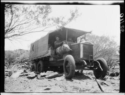 Keyser navigating the expedition's Morris Commercial truck through rocky terrain, Coniston Region, Northern Territory, 1928 / Michael Terry