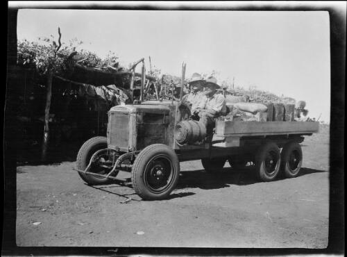 Jack Keyser, Don Hood and Micheal Terry in a Morris Commercial truck at Tanami Police Camp, Northern Territory, 1928 / Michael Terry
