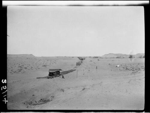 Railway workers clearing sand off an incomplete section of railway track, Central Australia?, approximately 1929 / Michael Terry