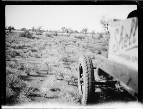 Morris Commercial truck driving through scrubland on the way to the Tanami goldfield, Central Australia, 1930 / Michael Terry