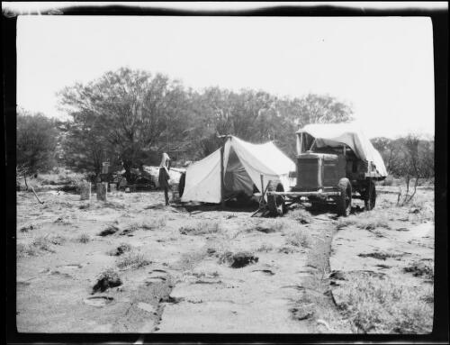 Morris Commercial truck at a campsite in sandy terrain, Central Australia?, approximately 1930 / Michael Terry