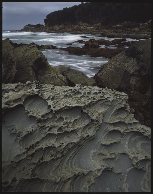 Eroded sandstone, South Cape Bay, southwest Tasmania, 1990, 1 [transparency] / Peter Dombrovskis