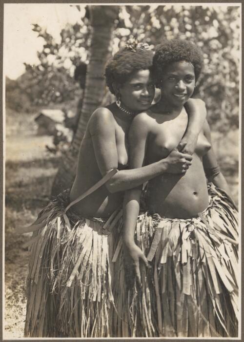 Girls from Mukawa [one girl has her arms around the other] [picture] / Frank Hurley