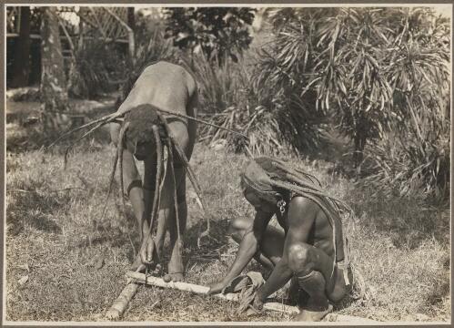 Mount Lamington types, fire making [picture] / Frank Hurley