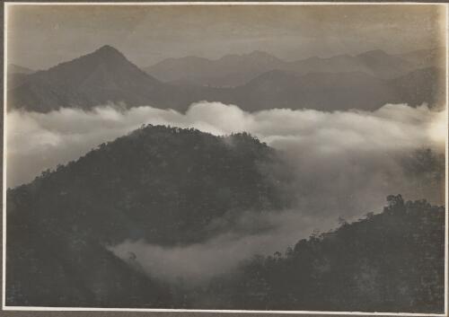 Views from Dilava Mission Station [mountains with cloud] [picture] / Frank Hurley