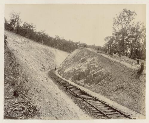 [A workman standing in a railway cutting] [picture] / Ryan & Thompson