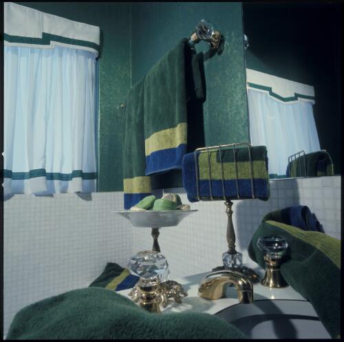 [An emerald green bathroom with white tiles and white and green curtains with green, blue and lime accessories, Sydney, ca. 1971] [transparency] / David Beal