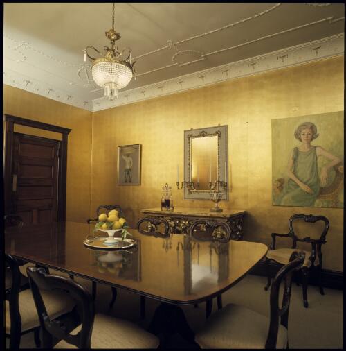 [Dining room with gold wallpaper, a mahogany table and a marble topped rococo and gilt serving table, Sydney, ca. 1971] [transparency] / David Beal