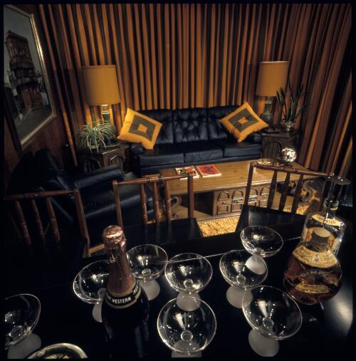 [Bar room in shades of bronze and orange with Boussac persimmon and olive striped curtains and furniture, Sydney, ca. 1971] [transparency] / David Beal