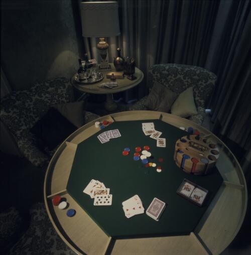 [A poker player's den viewed from above, packed with padded furniture, drawn curtains and custom-made green baize table, ca. 1971] [transparency] / David Beal