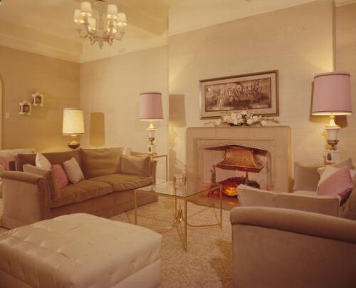 [The sitting room in the Marlene Dietrich Suite at the Australia Hotel, in shades of light brown, pink and cream with an open fireplace and a wide picture above the mantelpiece, ca. 1971] [transparency] / David Beal