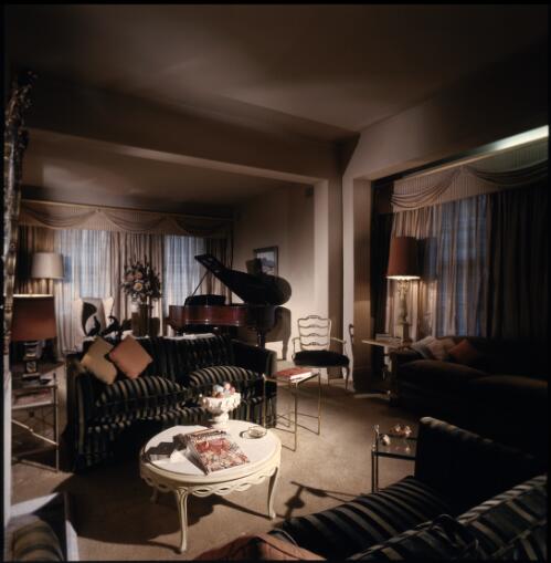 [Paper silk draperies and shadow-striped velvet settees decorate the lounge while a music annexe contains a Steinway grand piano, ca. 1971] [transparency] / David Beal