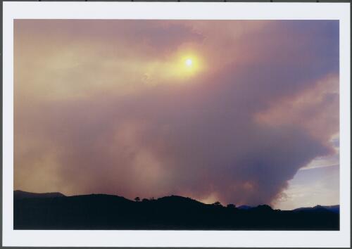 A wall of smoke rising to the west of the Brindabella Ranges is from strong burning on the Broken Cart fire in Kosciuszko National Park, Friday 17th January 2003 [picture] / Jeff Cutting