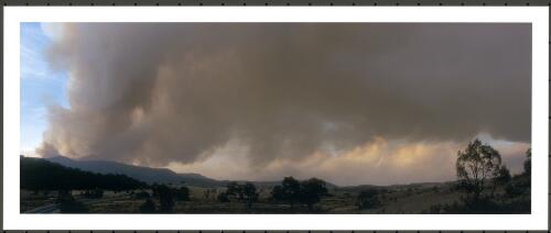Smoke from the breakaways of the Bendora Fire burning up the western slopes of the Tidbinbilla Range, and the (distant) McIntyres Hut fire burning towards the ACT border at 1952 hr, 17 January 2003 [picture] / Jeff Cutting