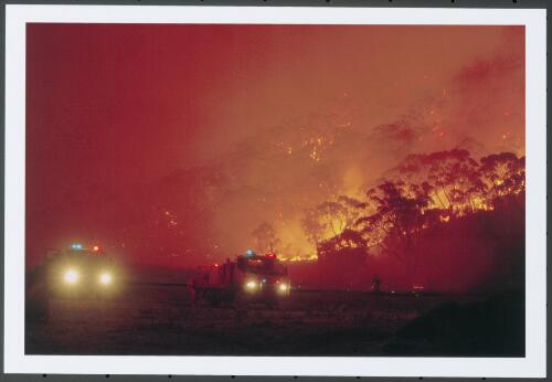 Bushfire fighters from Hunter District in N.S.W. keeping a watch for spot fires in the home paddocks at Ballineen as the Stockyard fire runs through, [17 January 2003] [picture] / Jeff Cutting