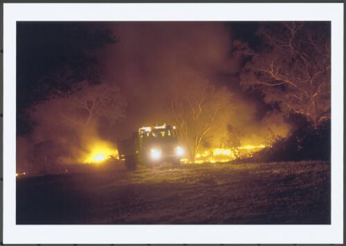 Protective back-burning along the western boundary of Tharwa village in the pre-dawn hours of 18 January 2003 [picture] / Jeff Cutting