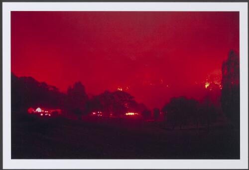 The historic Congwarra homestead in the Tidbinbilla district besieged by fire in the pre-dawn hours of 18th January 2003 [picture] / Jeff Cutting