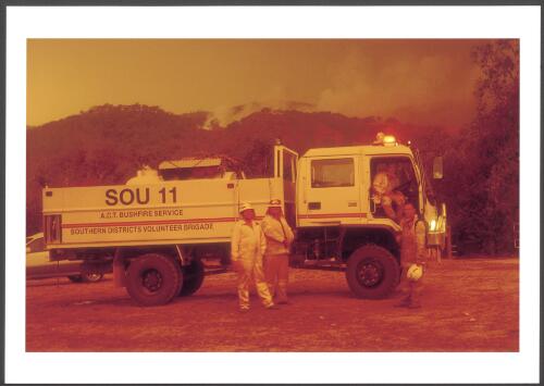 Volunteer firefighters from ACT Southern Districts Bushfire Brigade on standby for property protection at the Outward Bound School Tharwa, as the Stockyard fire burns through the district, [18 January 2003] [picture] / Jeff Cutting
