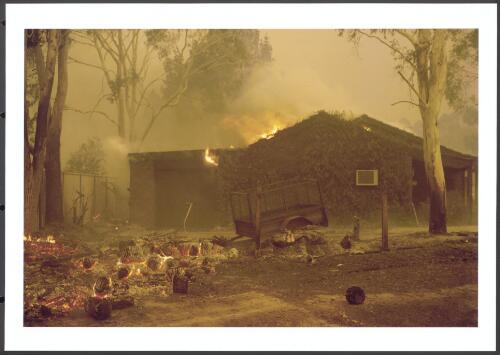 A prolonged ember attack from smouldering garden litter and a burning woodheap infiltrated the roof cavities of this garage and house until burnt out, Morant Circuit, Kambah, 18 [January] 2003 [picture] / Jeff Cutting