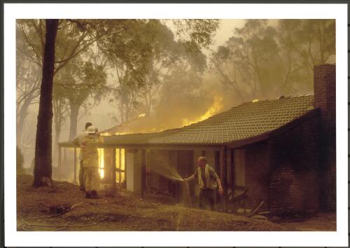 This resident in Kambah could do little more than watch as his house burnt out from end-to-end, [18 January 2003] [picture] / Jeff Cutting