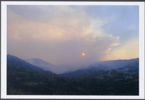 A smoky sunset in the hills behind Narbethong on Smiths Road, from fire resident in the Clear Range and the Top Naas area, 21st January 2003 [picture] / Jeff Cutting