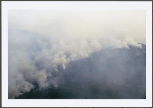 [Smoke rises from a bushfire in the ranges of the ACT, January 2003] [picture] / Jeff Cutting