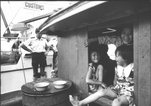 [Three girls in cabin on the boat from Vietnam, Darwin, November 1977] [picture] / Michael Jensen