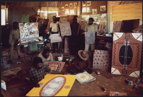 [Group portrait of Indigenous artists with their art works at the studio, Papunya, 1972] [picture] / Michael Jensen