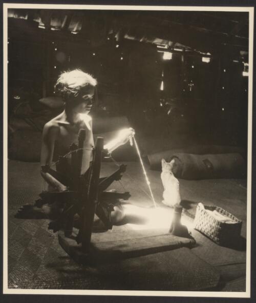 A Dayak girl spinning, Sarawak, ca. 1950 [picture] / Hedda Morrison
