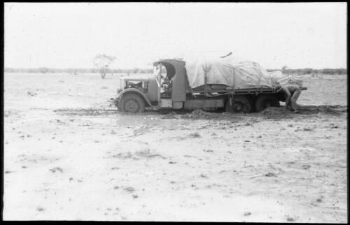 Bogged lorry during Frank Clune's trip to research Burke & Wills' expedition in 1935-1936 [picture]