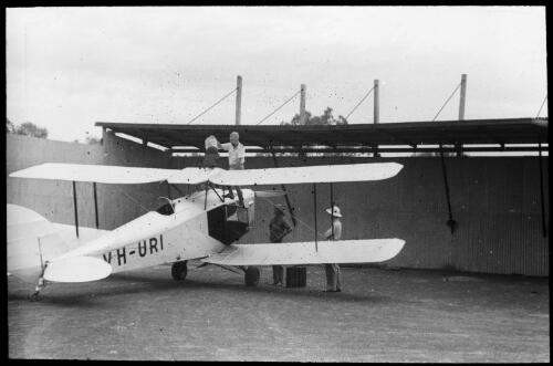 Aerial ambulance, a De Havilland DH 83 Fox Moth aeroplane, registered as VH-URI used in Queensland in the 1930s [picture]