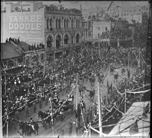 [The Duke & Duchess of Cornwall & York driving along Bourke Street, Melbourne, May 1901] [transparency]