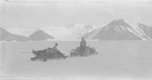 Three explorers beside their sleds at Ferrar Glacier during a geological expedition, Antarctica, 30 November, 1911 [picture] / Thomas Griffith Taylor
