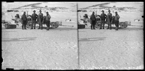 Four explorers beside a motor sled at Cape Evans, Antarctica, 23 October, 1911 [picture] / Thomas Griffith Taylor