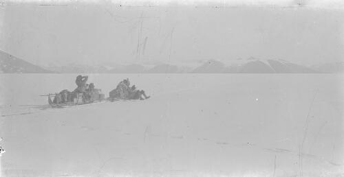 Three explorers and their sleds at Kukri Hills, Antarctica, 1911 [picture] / Thomas Griffith Taylor