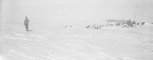 Line of stakes on Barne Glacier, north of Cape Evans hut, Antarctica, 24 October, 1911 [picture] / Thomas Griffith Taylor
